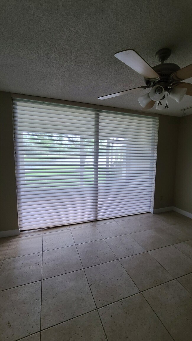 Hunter Douglas custom blinds throughout - 7380 NW 1st St