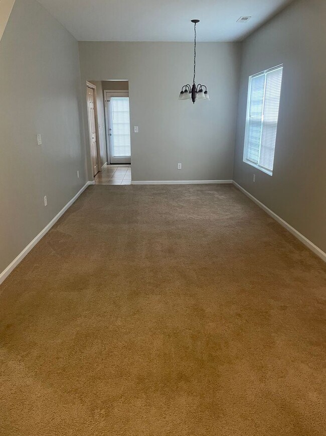 Foto del edificio - This two-story, 4-bedroom, 2-bath duplex in Fort Mill, SC sits on a corner lot