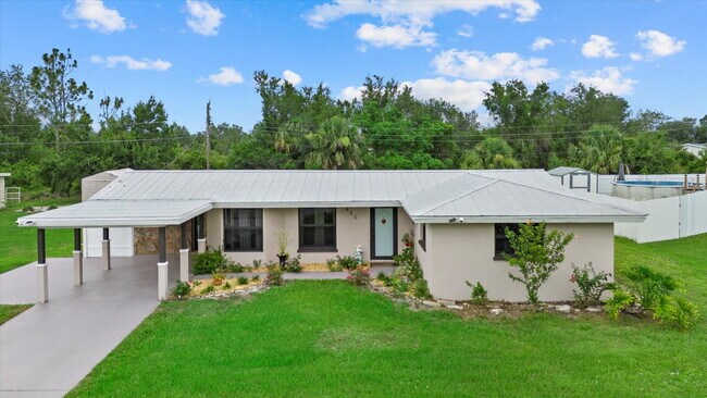 Building Photo - 3-Bedroom Punta Gorda Retreat with Marble ...