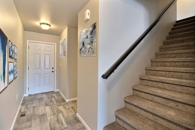 Building Photo - Stunning 2-Story Twin Home in Vibrant Lake...