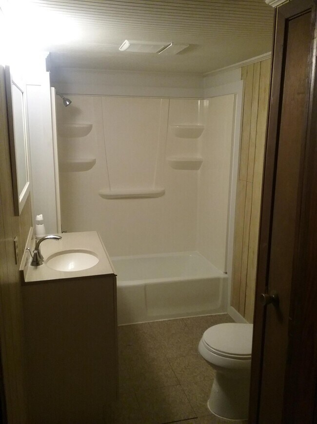 Clean bathroom with linen closet - 5011 Mire Hwy