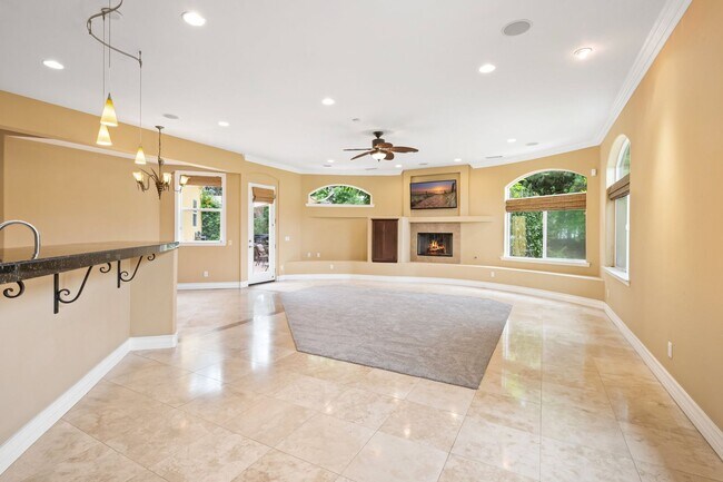 Building Photo - Stunning custom home in a highly sought-af...