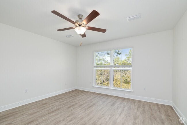 3BR, 2.5BA - 1,550SF - Primary Bedroom - Cottages at Mack Bayou