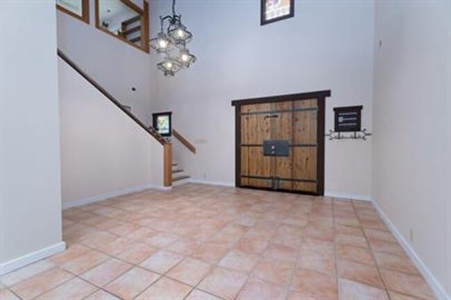 Building Photo - Uniquely breathtaking custom home with in-...