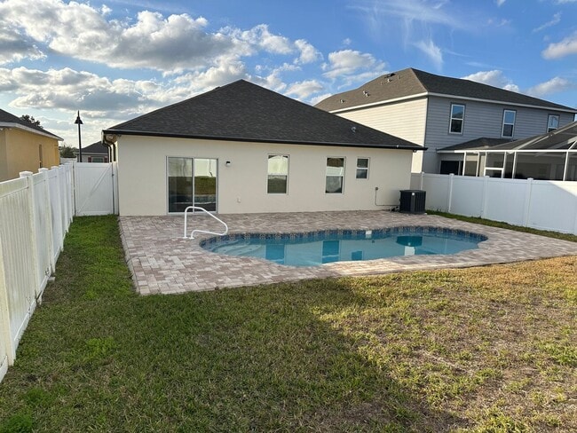 Building Photo - FOR RENT - 4 BEDROOM/ 2 BATHROOM HOUSE WITH POOL IN DAVENPORT