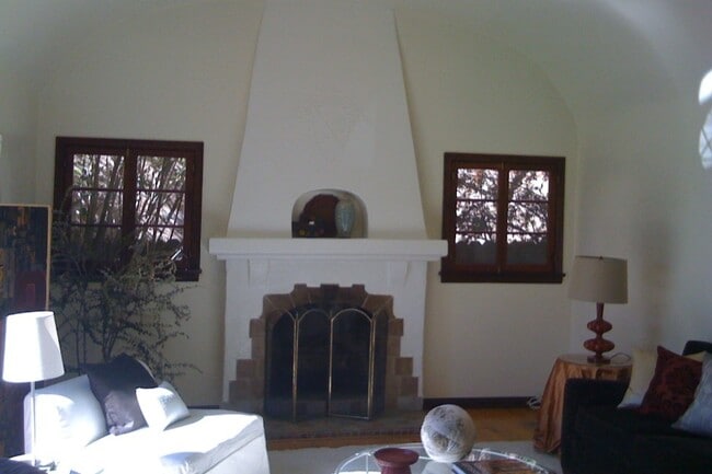 Spanish-tile Fireplace Graces the Living Room - 9135 Gibson St