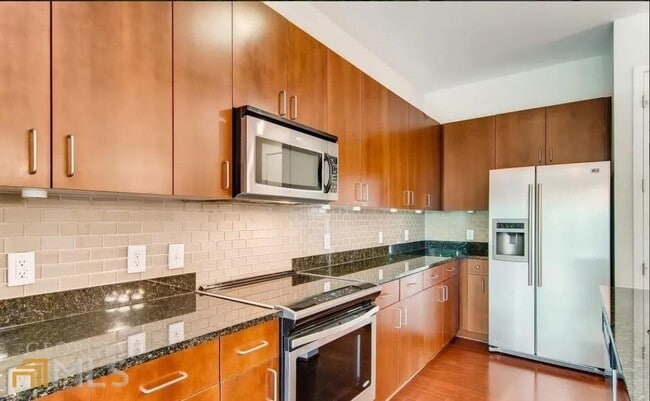 Building Photo - 711 Cosmopolitan Dr NE