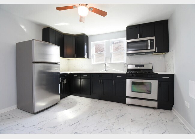 Foto del edificio - 5128 W Henderson St