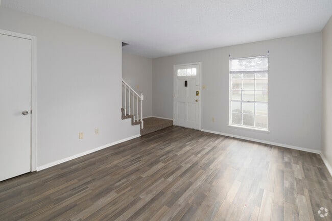 Living Room - Camelot Apartments and Townhomes