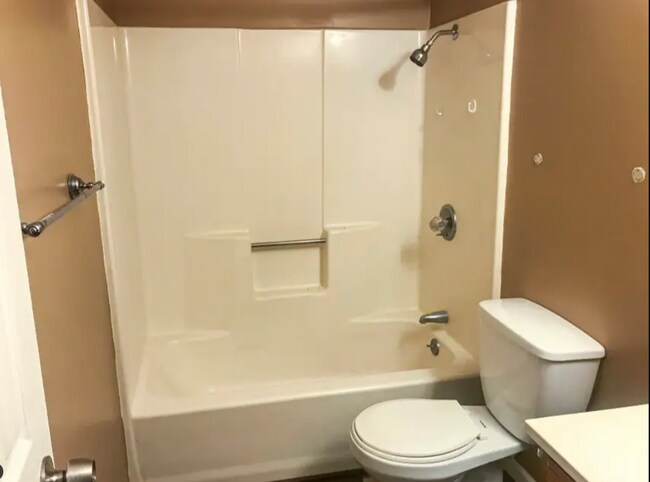 Foto del edificio - 5516 NW Cimarron Dr