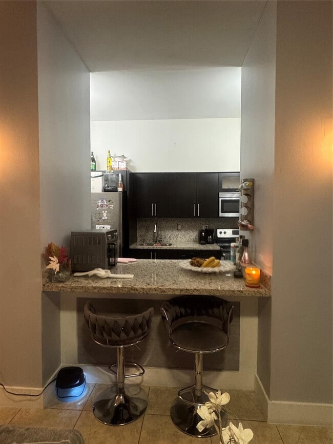 Building Photo - 7420 W 20th Ave