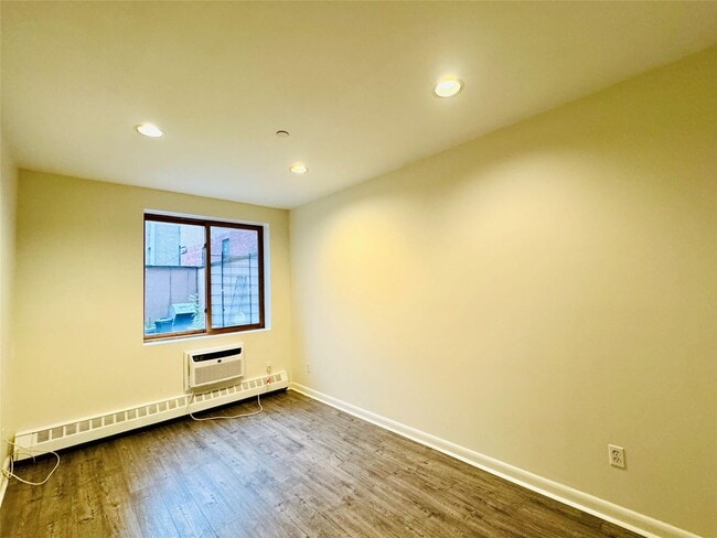 Building Photo - 118-82 Metropolitan Ave