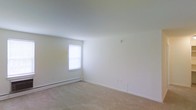 Located at 30 Nutt Road in Phoenixville, Pennsylvania, this single-floor residential unit offers a clean, straightforward layout designed for comfortable everyday living. The interior is finished with neutral white walls throughout, creating a bright and versatile backdrop that adapts easily to a variety of décor styles. Soft wall-to-wall carpeting covers the floors, adding warmth and a sense of coziness to the living spaces. Natural light filters in through windows dressed with simple blinds, lending an airy quality to the rooms. Baseboard heating runs along the lower walls, providing an efficient and consistent heat source during cooler months. The overall aesthetic is understated and move-in ready, with clean lines and a well-maintained finish throughout. The single-level layout offers easy accessibility and straightforward navigation between spaces. Situated in Phoenixville, PA, residents benefit from proximity to the borough's vibrant downtown, local dining, shopping, parks, and cultural amenities, making this a practical and well-located option for those seeking a low-maintenance living space in a welcoming community.