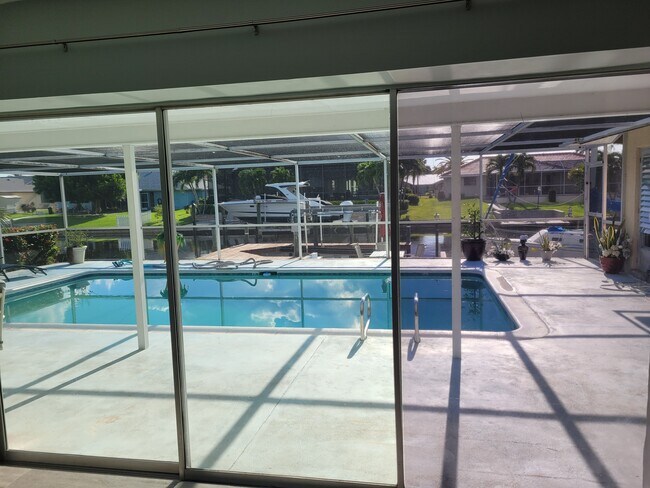 Pool and canal view - 4902 Tudor Dr