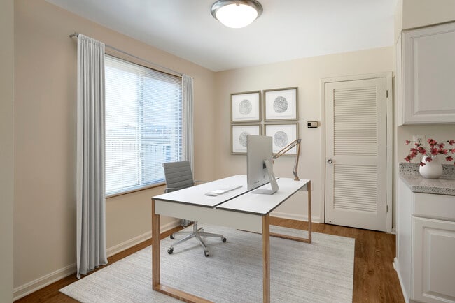 Renovated Package I apartment homes featuring hard surface flooring in select units - Tysons Crossing