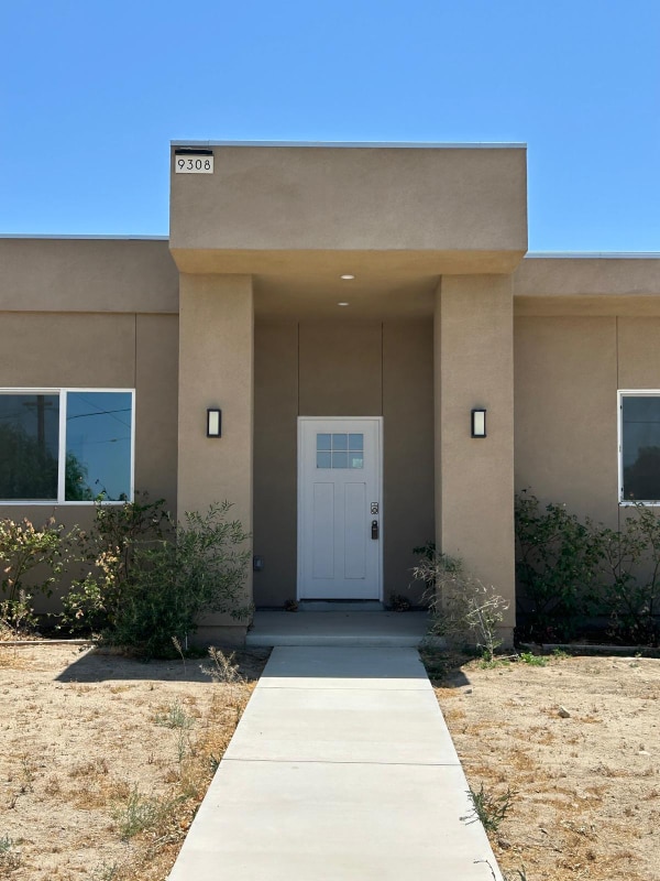 Building Photo - 9308 E Ave T 6