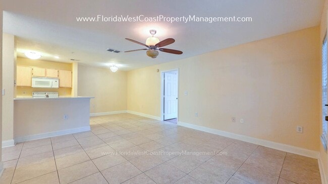 Building Photo - MOVE IN READY! LARGE 2 BEDROOM/2 BATH PLUS ATTACHED GARAGE! TILE/LVP THROUGHOUT!