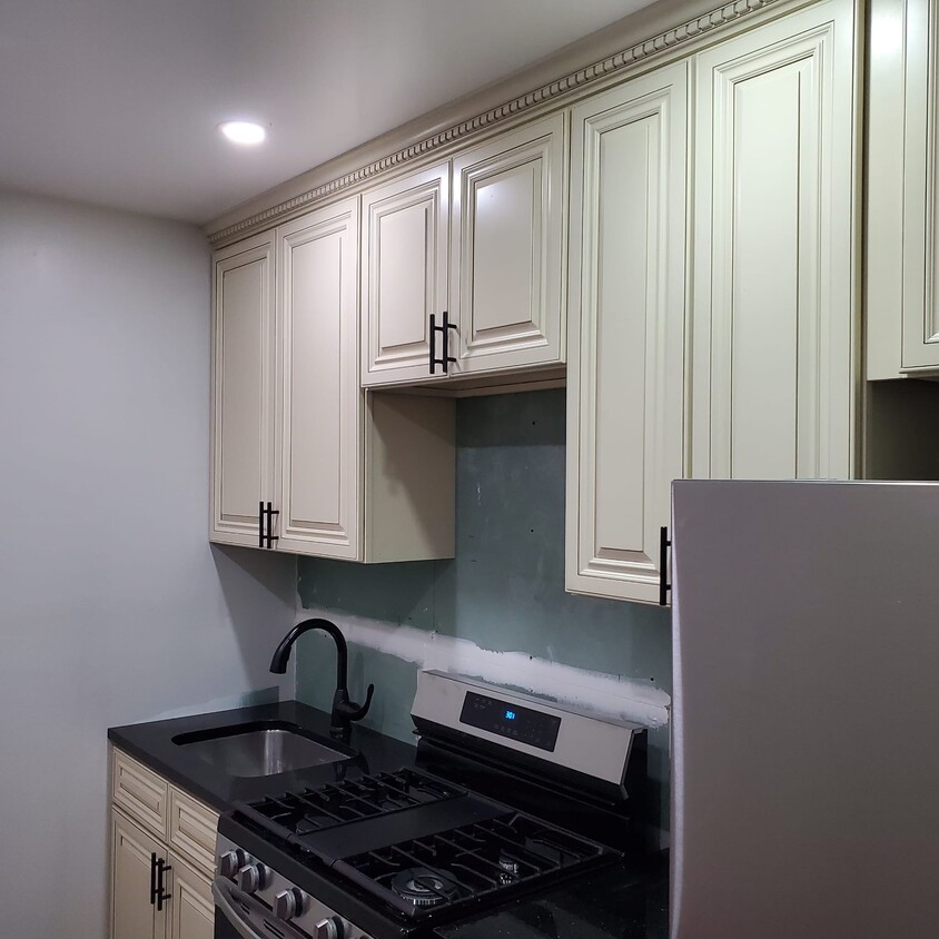 Kitchen, backsplash to be installed. New appliances - 4204 Foster Ave