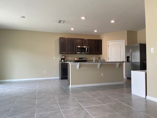 Building Photo - 9009 Tuscan Cypress St