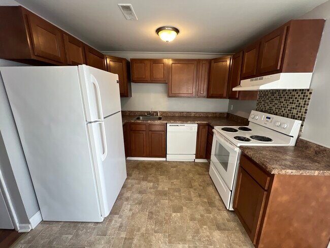 Foto del edificio - Denrose Townhomes