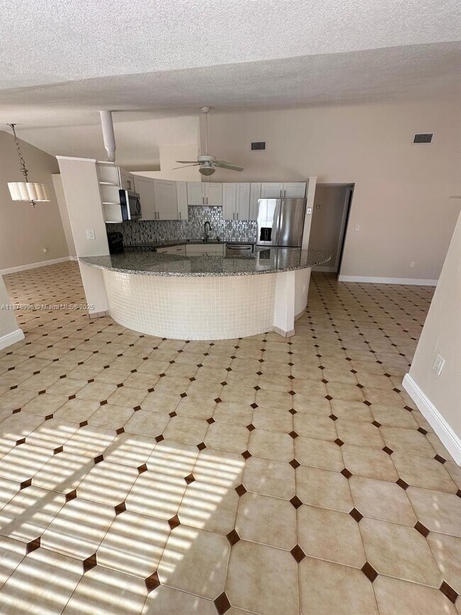 Building Photo - 9015 SW 102nd Ct