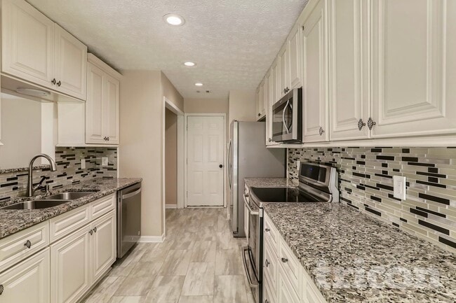 Building Photo - 2024 Atha Woods Dr