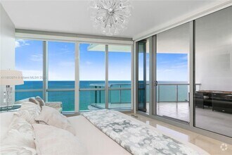 Building Photo - 17121 Collins Ave