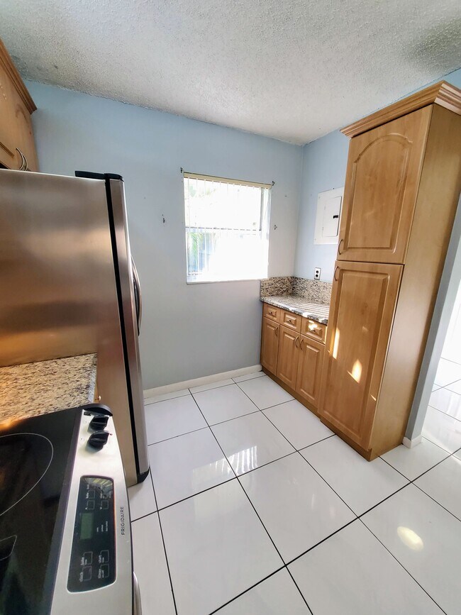 Kitchen with added stroage - 1820 N Lauderdale Ave