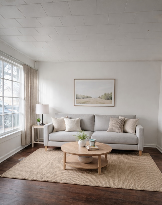 Living room virtually staged - 281 E North End Ave