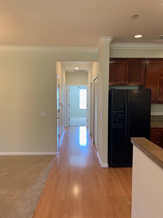 Hall with 2 closets and laundry room - 5761 Mountain Hawk Dr