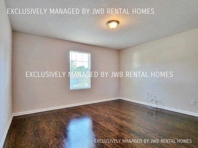 Building Photo - 8409 McGirts Village Ln