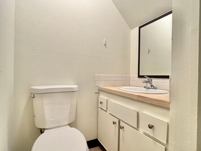 Building Photo - Spacious Home with Fenced Backyard and garage. W/S/G included!