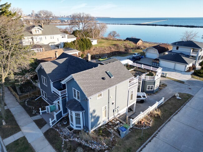 Rental is on the 2nd floor of this corner home, up the street from the Lake! Amazing views! - 2650 S Shore Dr