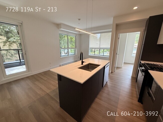 Building Photo - Modern Corner Unit Condo