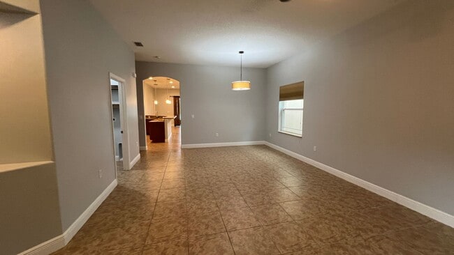 Building Photo - Serene Lakefront Living at Its Best! 4BD/3...