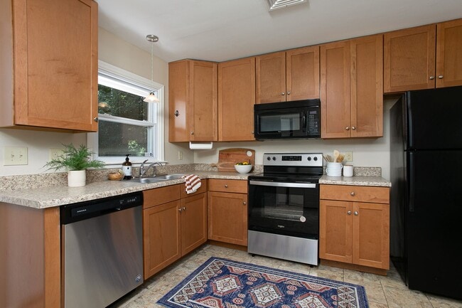 Building Photo - Spacious 1 Bedroom Duplex close to UNC Campus - Updated, Pet Friendly, Private Wooded Lot!