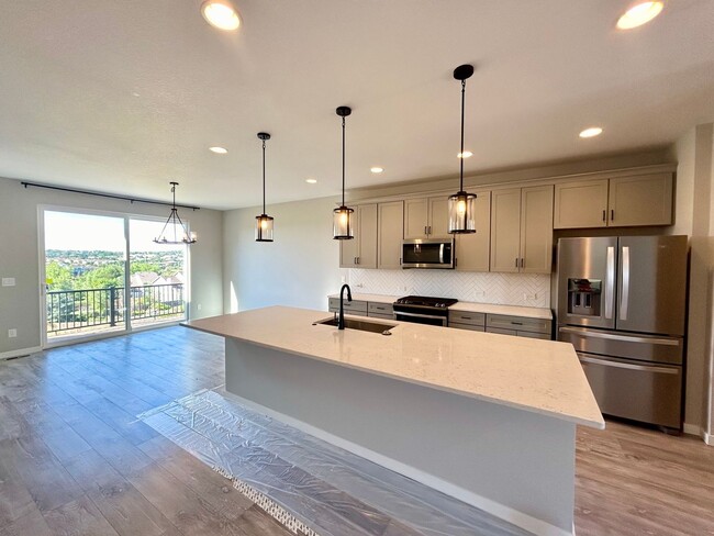 Building Photo - Impressive 4 Bedroom Townhome Nestled in M...