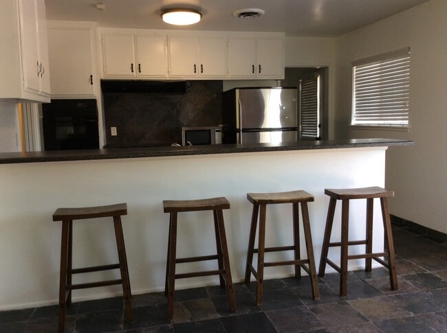 Kitchen includes Bar Stools - 4171 Mt Vernon Ave House
