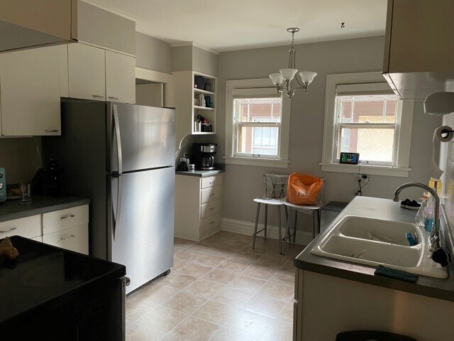 Eat-in kitchen - plenty of room for table under windows - 4852 Upton Ave S