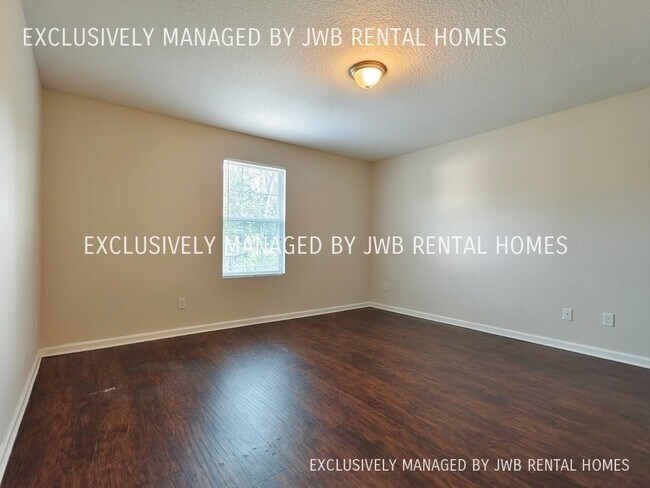 Building Photo - 8419 McGirts Village Ln