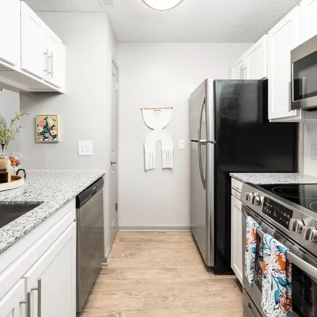 Building Photo - Trinity at the Hill