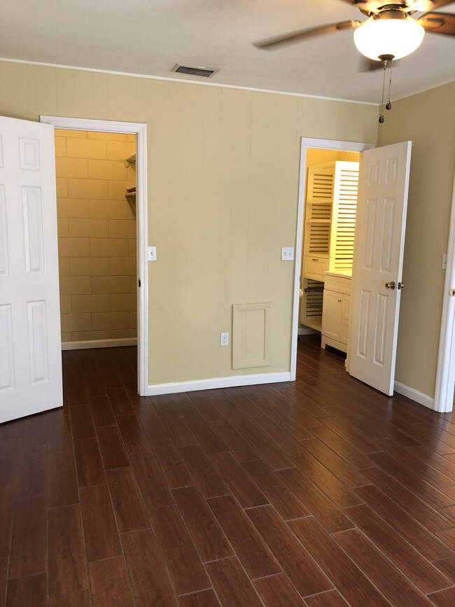 Bedroom - facing bathroom and walk-in closet - 2241 W Pensacola St