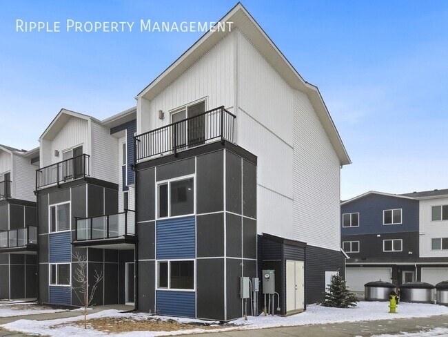 Photo du bâtiment - BRAND NEW 4 BEDS + DEN, 3.5 BATHS TOWNHOUSE | DOUBLE ATTACHED GARAGE