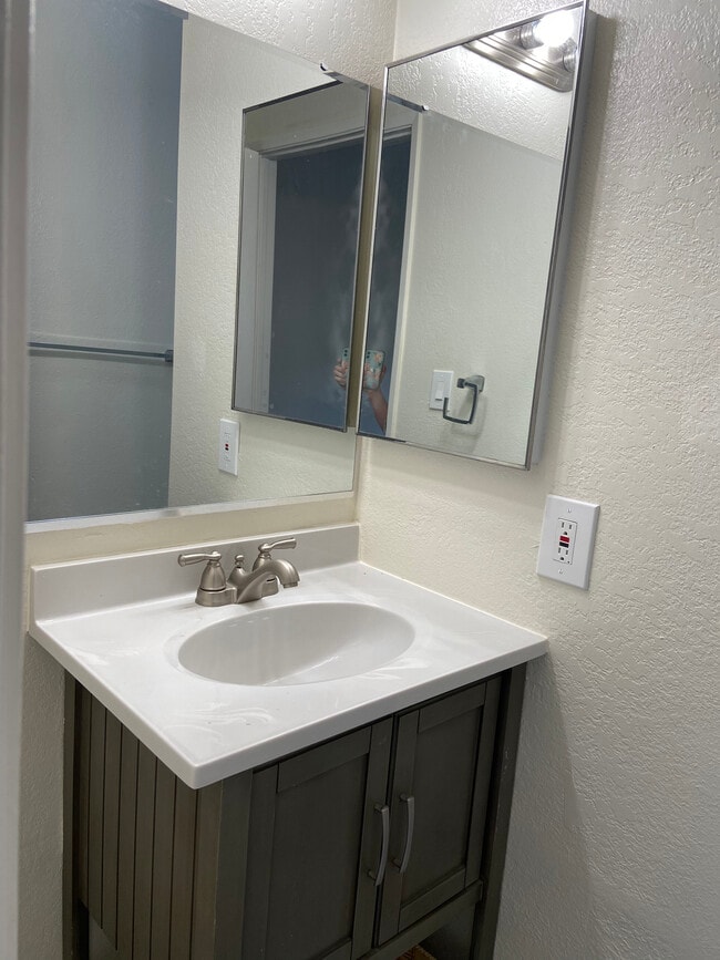 Renovated full master bathroom.with subway tile and tub/shower combo - 4179 Shafter Ave Townhome