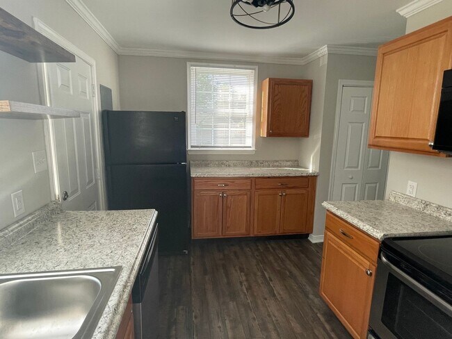 Building Photo - Coming Soon: Charming 3BR Home with Private Backyard
