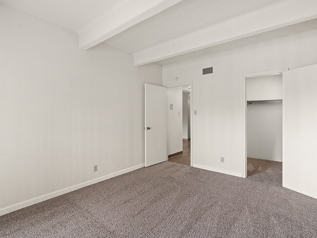 Bedroom with Walk-in Closet - La Vida Buena Apartments