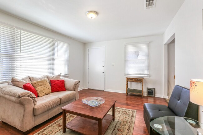 Living Room & plenty of natural light - 212 Claiborne Ct