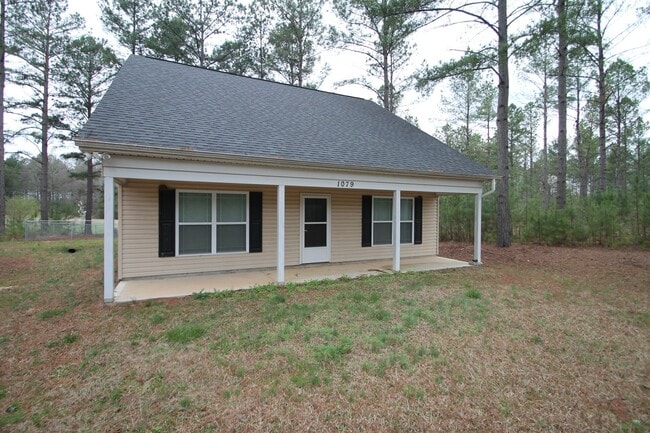 Building Photo - Exclusively Offered by Muse Realty Rentals...