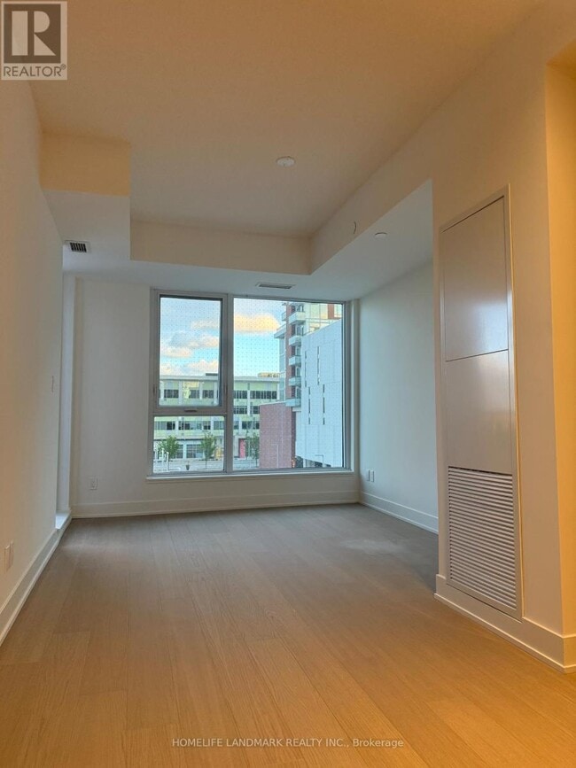Building Photo - 38-D438 Andre de Grasse St
