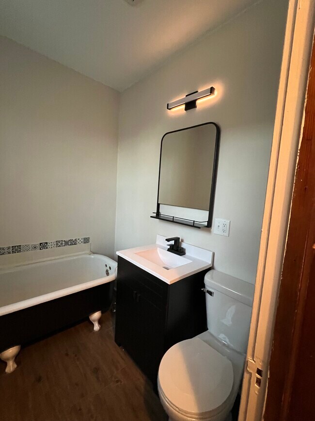 Bathrooms pics, shower and shelving being installed at end of month - 904 N 6th Ave E